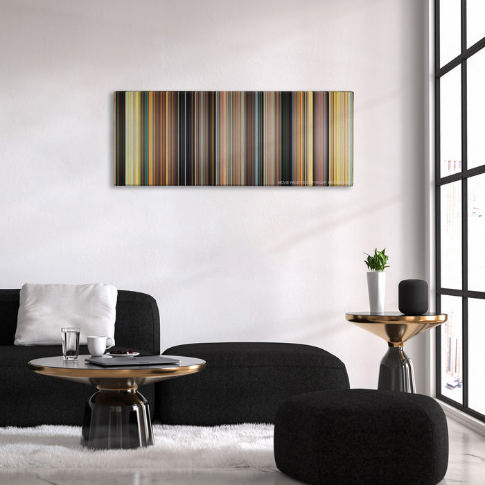 127 Hours color palette canvas above a black sofa with a gold-topped table