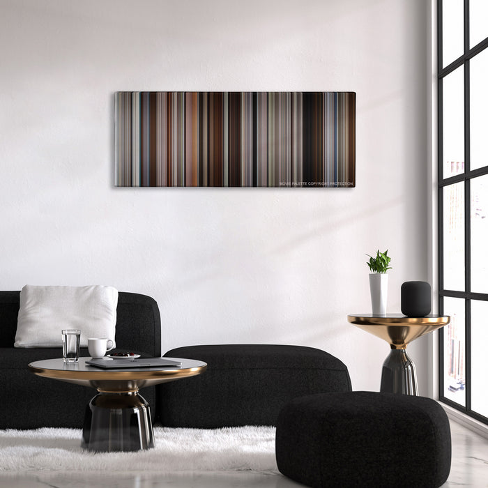 50/50 color palette canvas above a black sofa with a gold-topped table