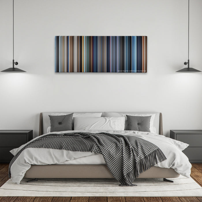 A.I. Artificial Intelligence color palette canvas above a bed, between two black pendant lamps