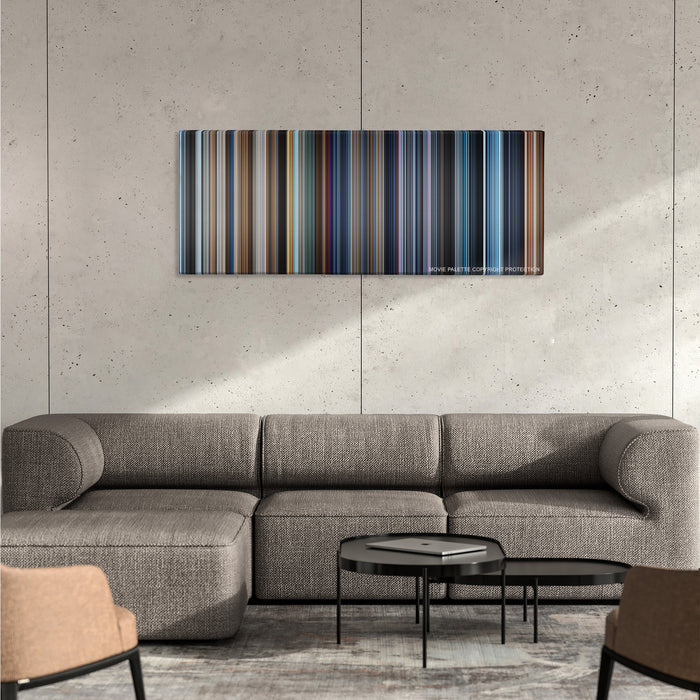 A.I. Artificial Intelligence color palette canvas on a concrete wall above a gray sectional sofa