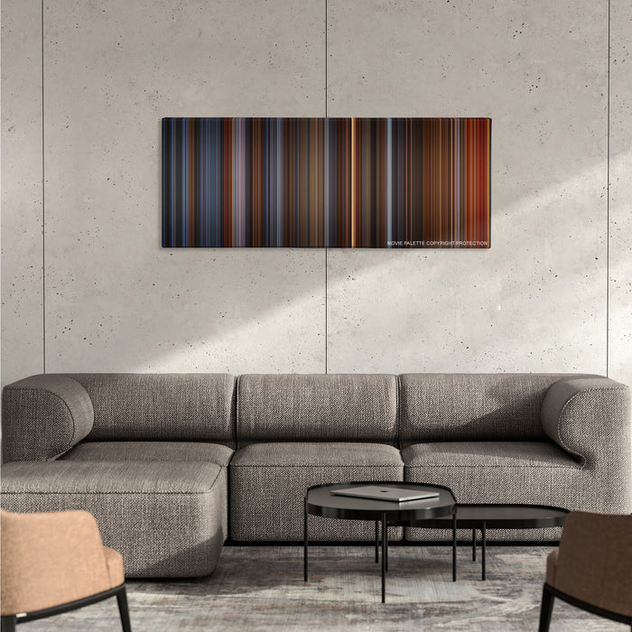 Alien3 color palette canvas on a concrete wall above a gray sectional sofa