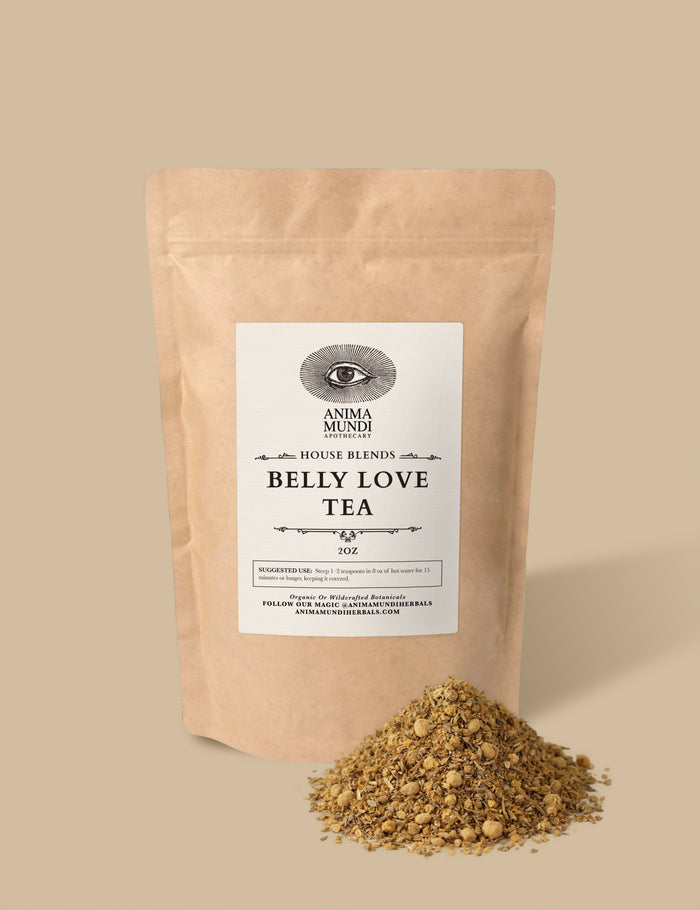 Belly Love Tea package with loose tea on a beige background