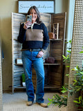 Rugby sweater with wide rust center stripe and black sleeves, ribbed hem