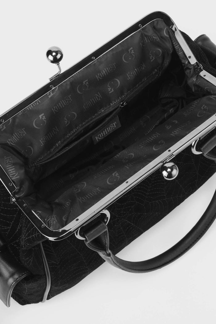Black handbag with visible brand logo on a white background