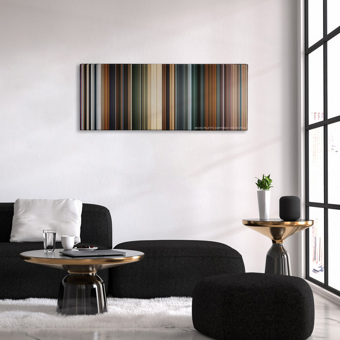 Clash of the Titans color palette canvas above a black sofa with a gold-topped table