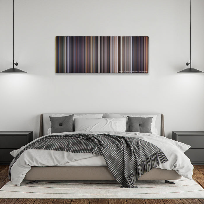 Con Air color palette canvas above a bed, between two black pendant lamps