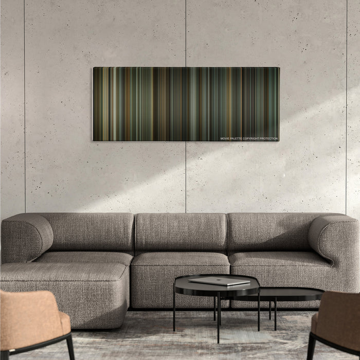 Downfall color palette canvas on a concrete wall above a gray sectional sofa