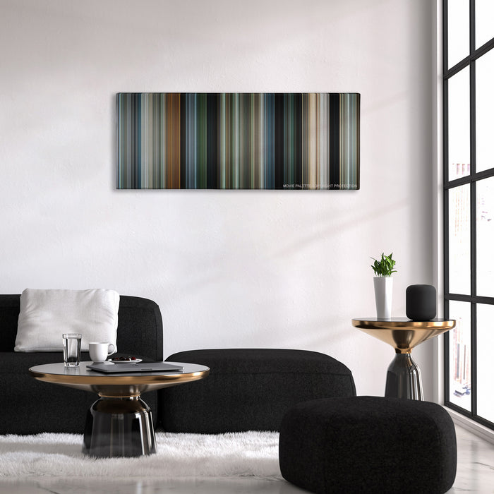 Due Date color palette canvas above a black sofa with a gold-topped table