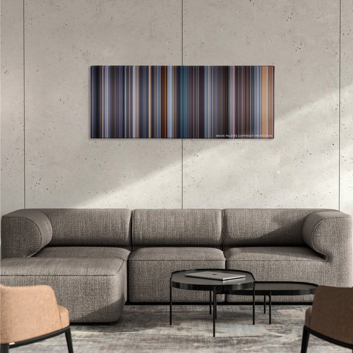 Equilibrium color palette canvas on a concrete wall above a gray sectional sofa