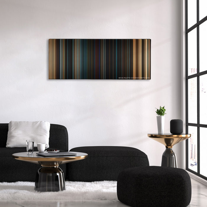 Fast & Furious color palette canvas above a black sofa with a gold-topped table