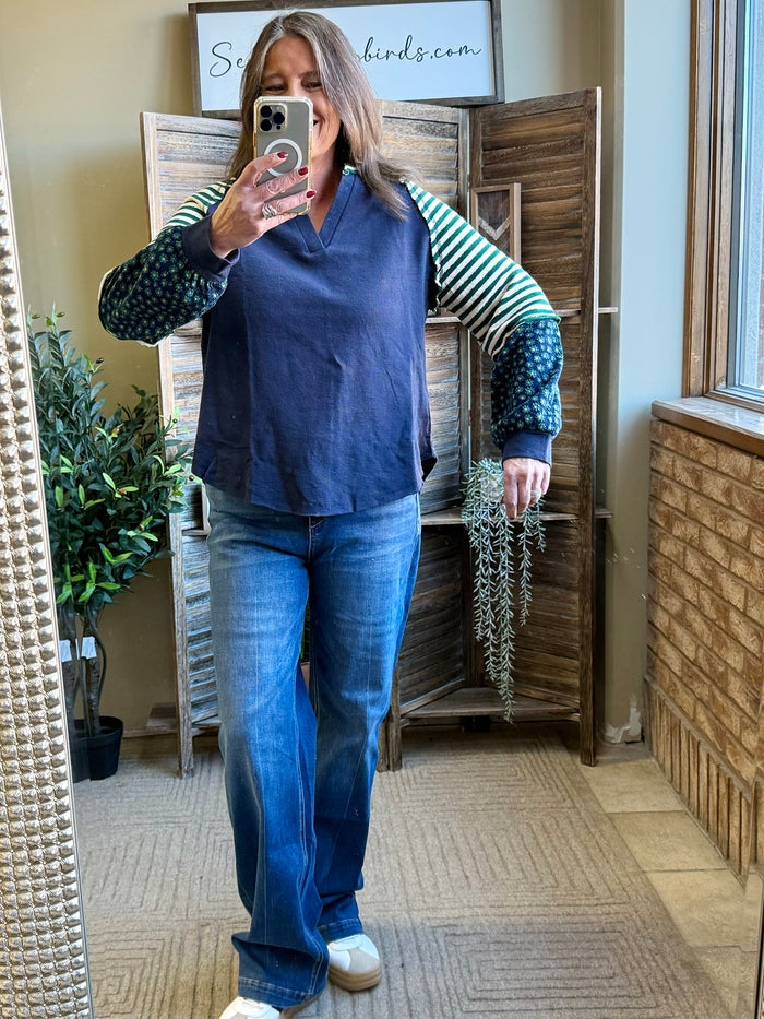 Floral sleeve waffle knit V-neck t-shirt with dark blue body and striped accents