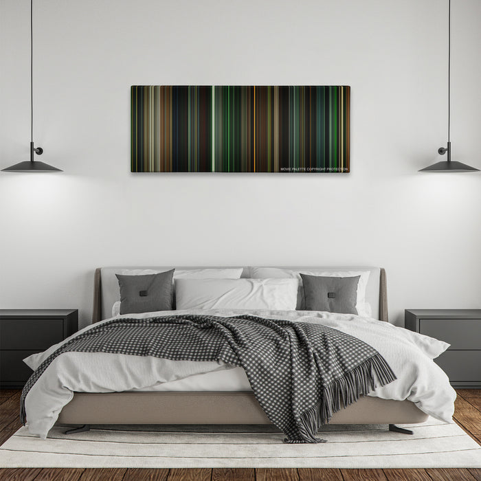 Green Lantern color palette canvas above a bed, between two black pendant lamps