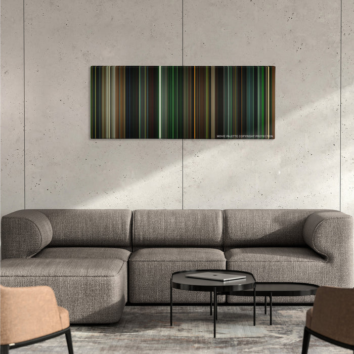 Green Lantern color palette canvas on a concrete wall above a gray sectional sofa