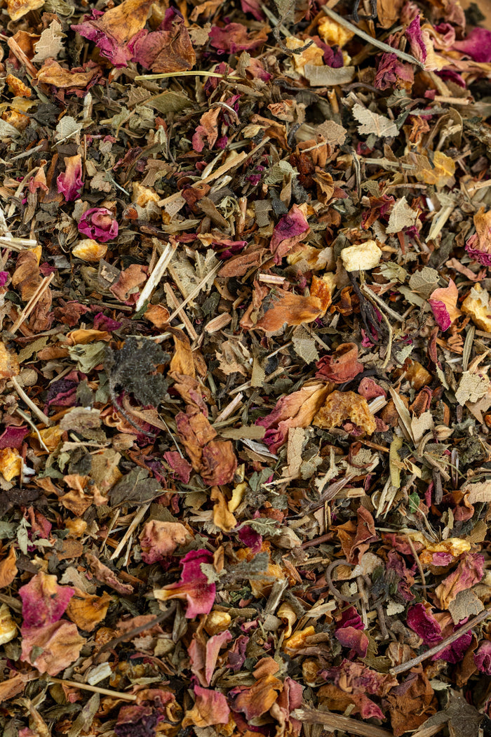 Close-up of a mix of dried herbs and flowers with various colors.