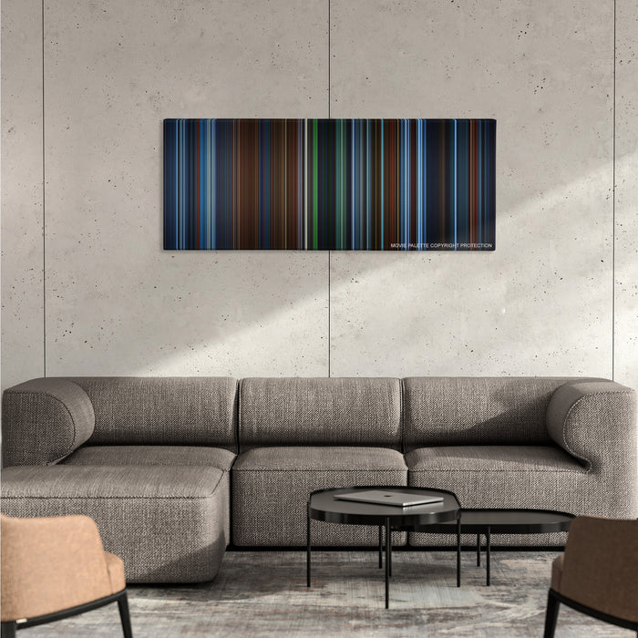 Hellboy color palette canvas on a concrete wall above a gray sectional sofa