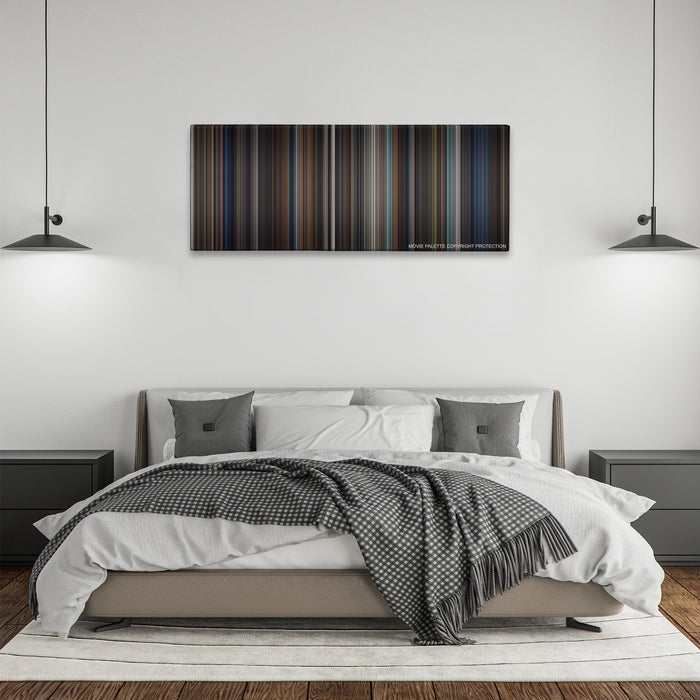 Hugo color palette canvas above a bed, between two black pendant lamps