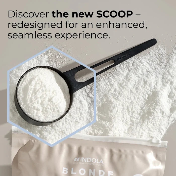 Indola Blonde Expert Lightener Up to 9+ Levels Of Lift White Powder 450g zoom in on scoop with powder