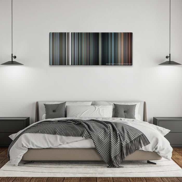 Inside Man color palette canvas above a bed, between two black pendant lamps