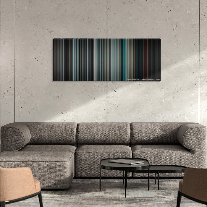 Insidious color palette canvas on a concrete wall above a gray sectional sofa