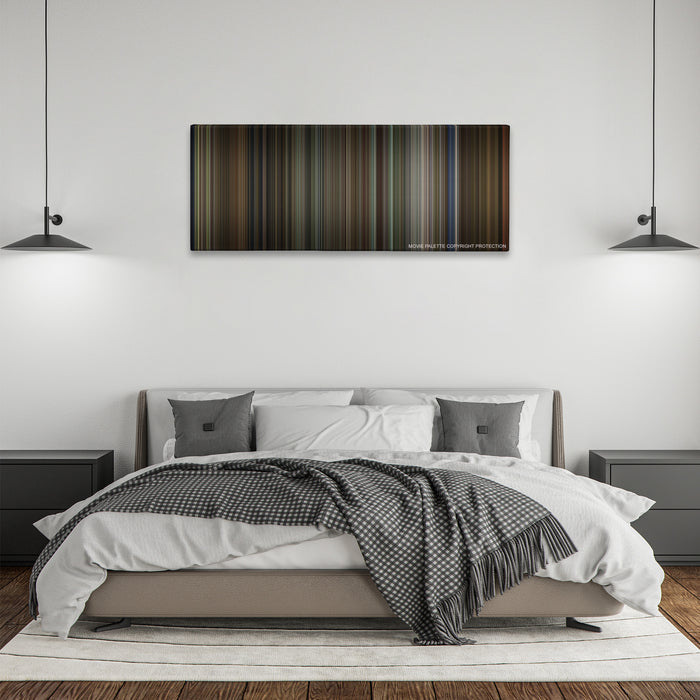 Jumanji color palette canvas above a bed, between two black pendant lamps