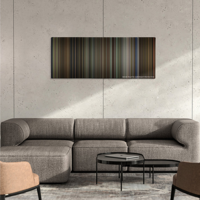 Jumanji color palette canvas on a concrete wall above a gray sectional sofa