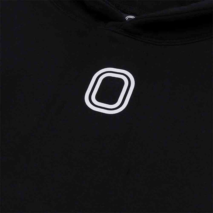 Up close view of emblem of the Youth Overtime Classic Hoodie.