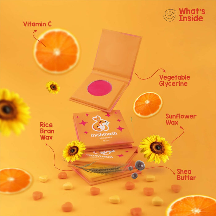 Mishmash product packaging with ingredients like Vitamin C, Vegetable Glycerine, Sunflower Wax, and Shea Butter on an orange background.