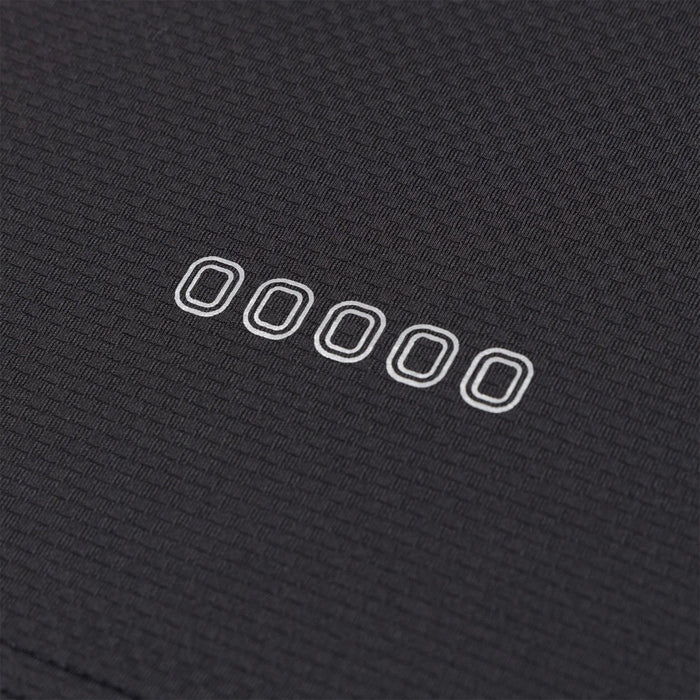 Up close view of emblem on the Overtime Kids' Tuff Performance Tee.