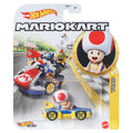 The Mattel Hot Wheels Mario Kart Replica Die Cast Vehicles line includes a Toad figure in a blue and yellow Mach 8, packaged with artwork of Mario, Bowser, and Yoshi—ideal for Mario Kart fans and collectors alike.