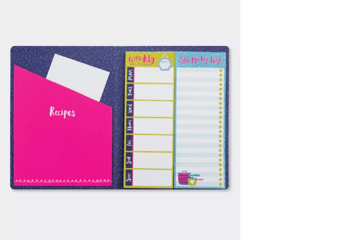 meal planner organiser notebook opened showing weekly meal plan and shopping list