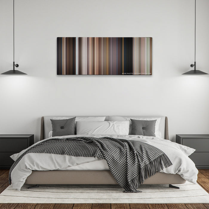 Men in Black 3 color palette canvas above a bed, between two black pendant lamps