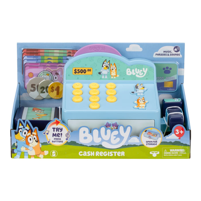 The Moose Toys Bluey Cash Register by Moose Toys comes with play money, coins, a scanner, and buttons. The box features Bluey characters and is labeled for ages 3+, with music, phrases, and sounds for pretend shopping fun.
