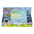 The Moose Toys Bluey Cash Register by Moose Toys comes with play money, coins, a scanner, and buttons. The box features Bluey characters and is labeled for ages 3+, with music, phrases, and sounds for pretend shopping fun.
