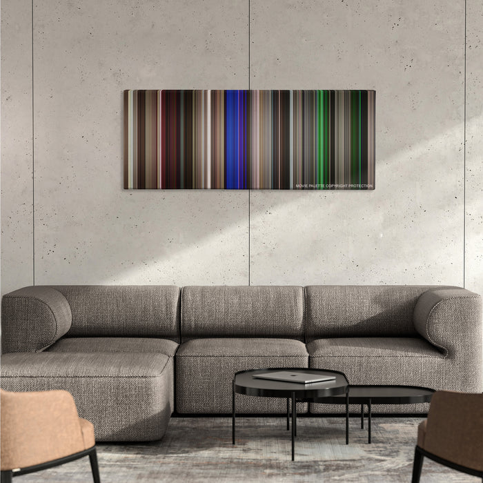 Neighbors color palette canvas on a concrete wall above a gray sectional sofa