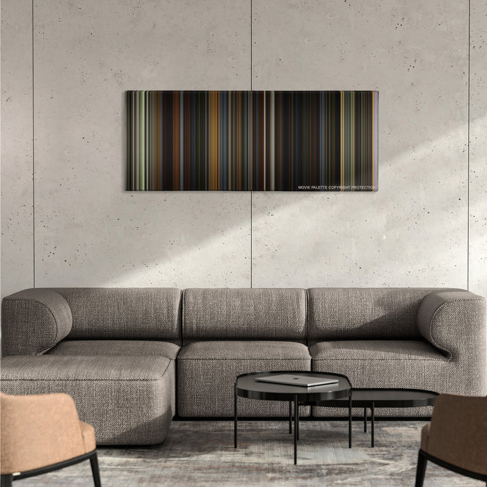 Public Enemies color palette canvas on a concrete wall above a gray sectional sofa
