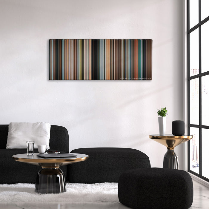 RED color palette canvas above a black sofa with a gold-topped table