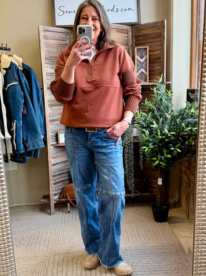 Rust quarter-zip pullover shirt with front zip and relaxed fit, long sleeves