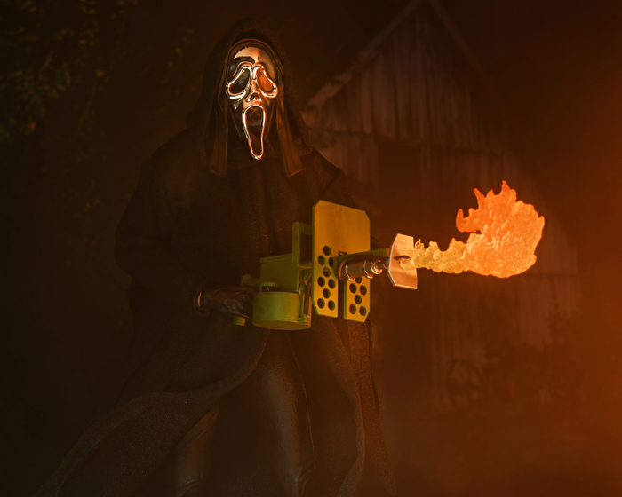 Toy wearing a mask with glowing eyes and mouth, holding a weapon with flames in a dark setting
