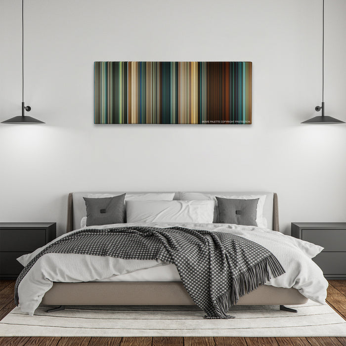 Seven Pounds color palette canvas above a bed, between two black pendant lamps