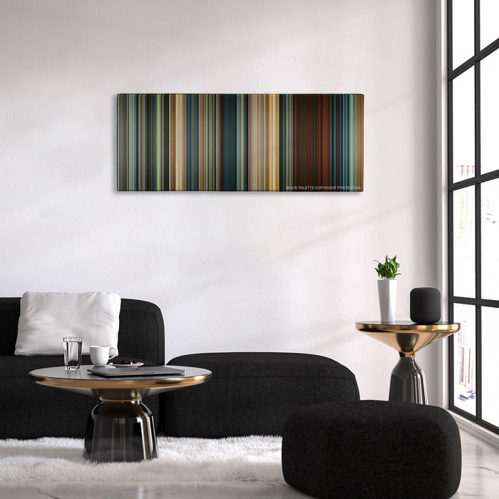 Seven Pounds color palette canvas above a black sofa with a gold-topped table