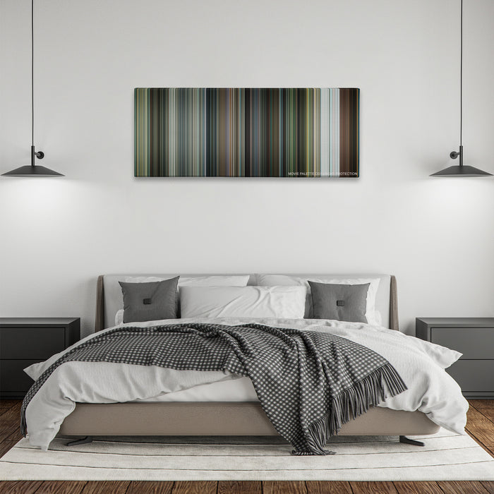 Shooter color palette canvas above a bed, between two black pendant lamps