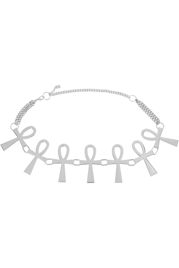 silver belt featuring ankh symbols on a plain background