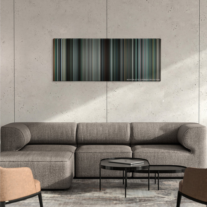 Terminator Salvation color palette canvas on a concrete wall above a gray sectional sofa