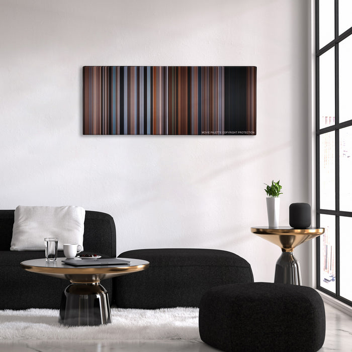 The Accountant color palette canvas above a black sofa with a gold-topped table