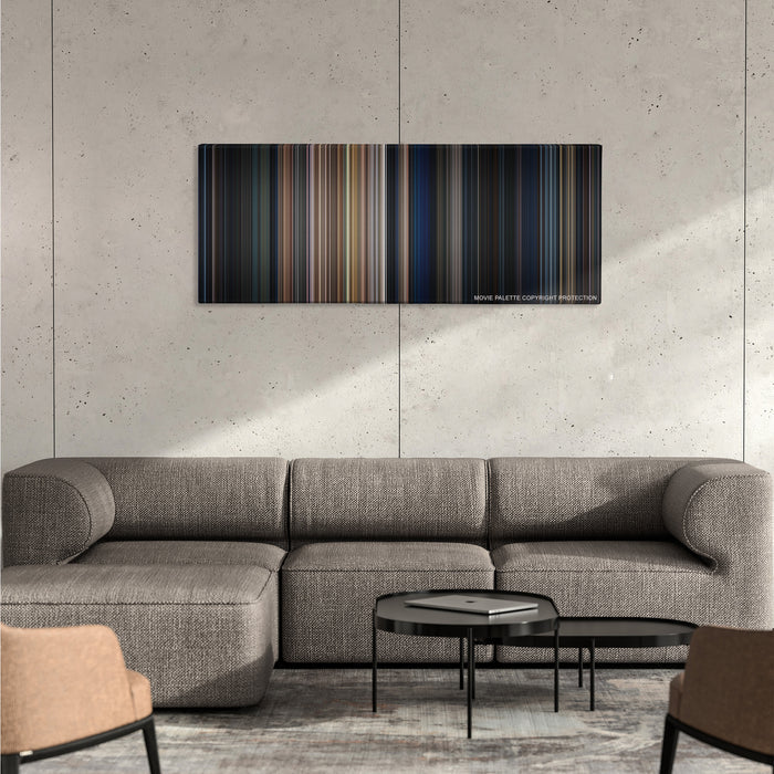The Expendables color palette canvas on a concrete wall above a gray sectional sofa