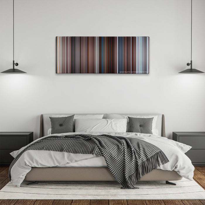 The Mist color palette canvas above a bed, between two black pendant lamps