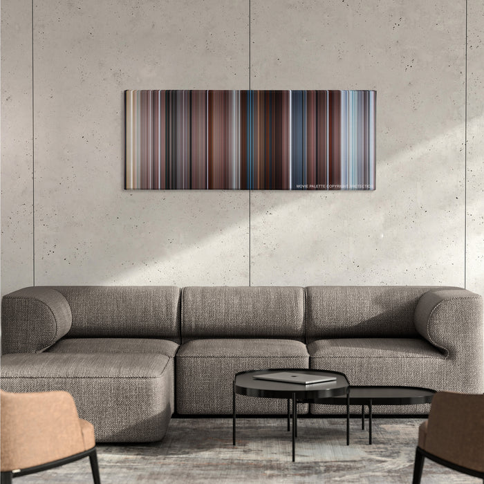The Mist color palette canvas on a concrete wall above a gray sectional sofa