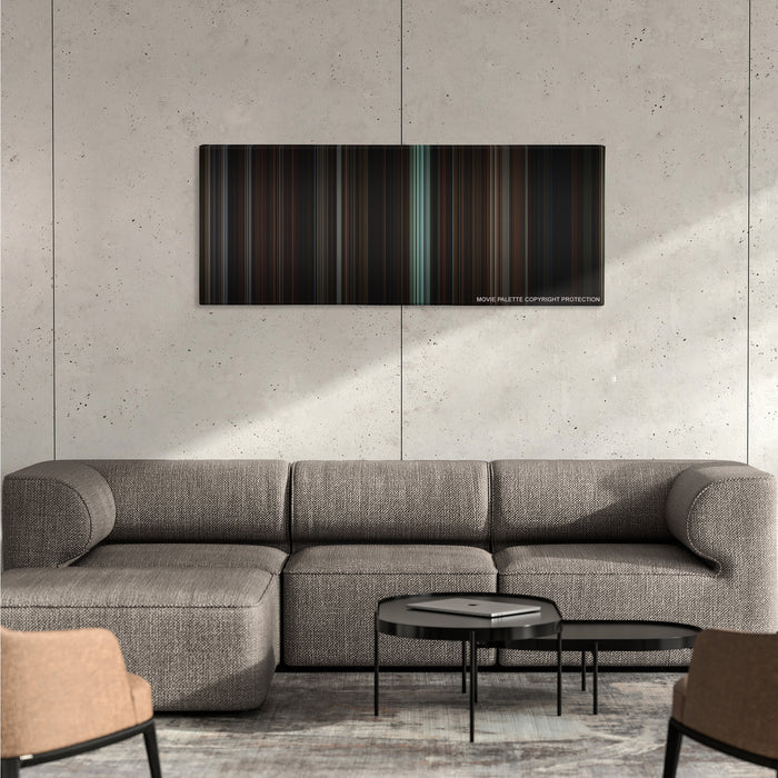 The Others color palette canvas on a concrete wall above a gray sectional sofa