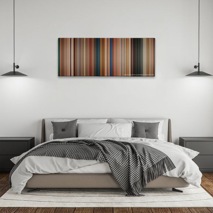The Transporter color palette canvas above a bed, between two black pendant lamps