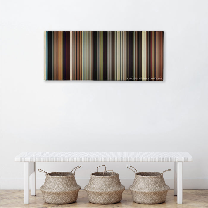 The Wrestler color palette canvas above a white bench with three woven baskets